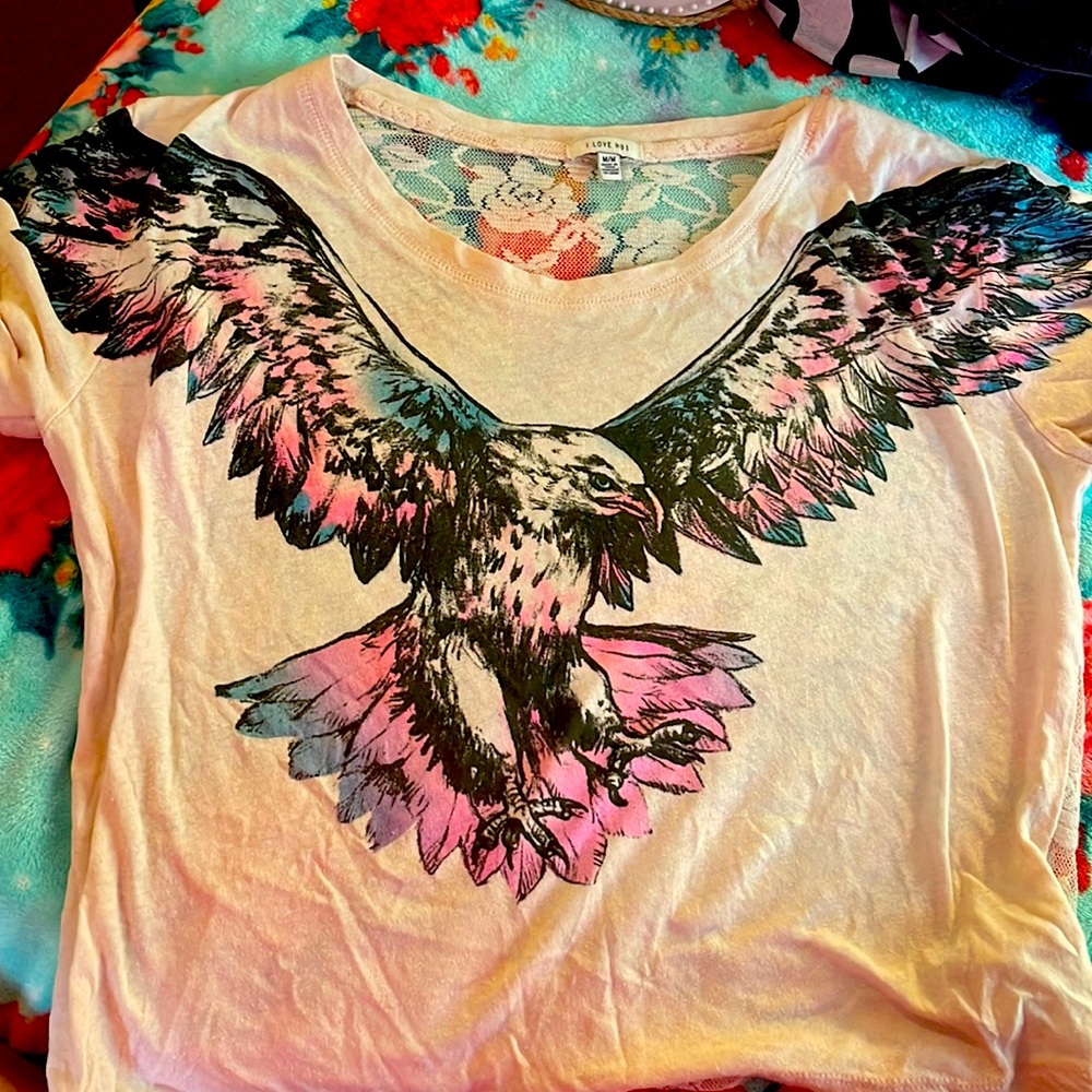 Shirts Lacey roses 🌹 in the back 🥁the front is a huge beautiful 💖💙💘eagle